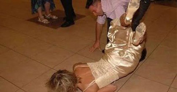 woman falling at wedding