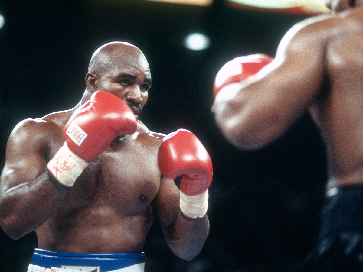Tyson Disqualified After Biting Holyfield's Ear