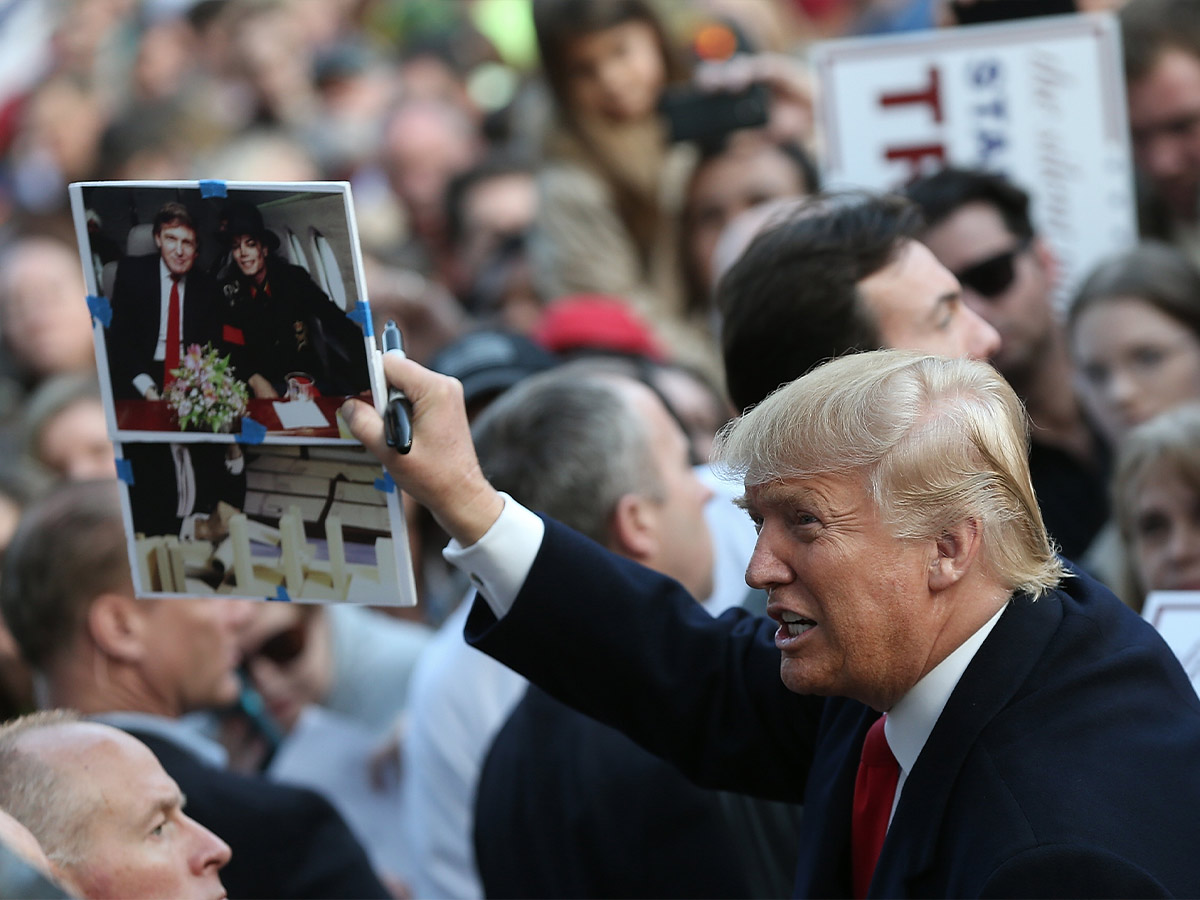 Trump Holding Up a Picture With the Prince of Pop