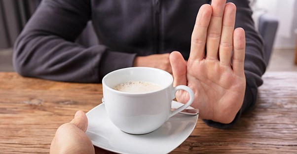 Person refusing coffee