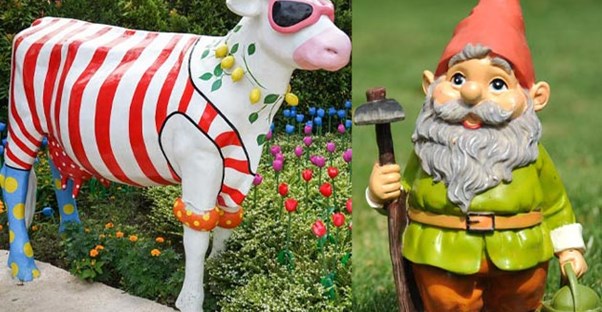 Cow statue and garden gnome