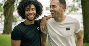 two guys smiling