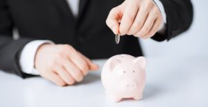 Man saving up to pay off his small business loan