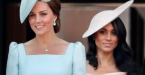 Kate Middleton and Meghan Markle standing side by side
