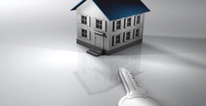 small house looming over a key