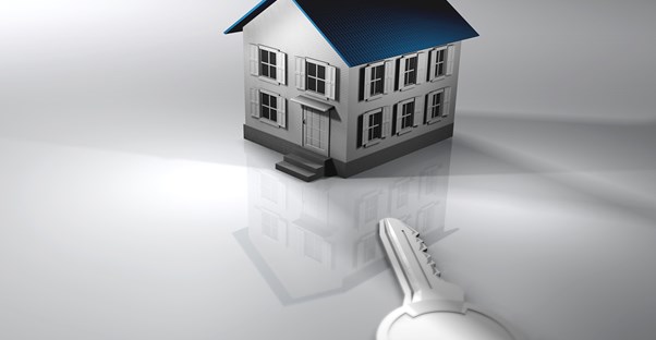 small house looming over a key