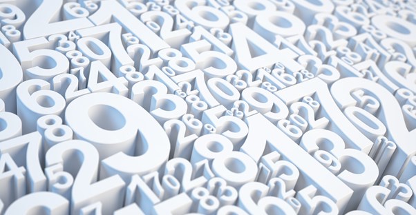 Large and small white numbers in a crowd