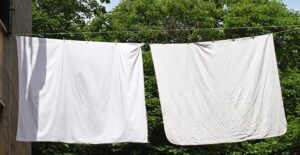hanging bed sheets have been cleaned and rid of bed bugs