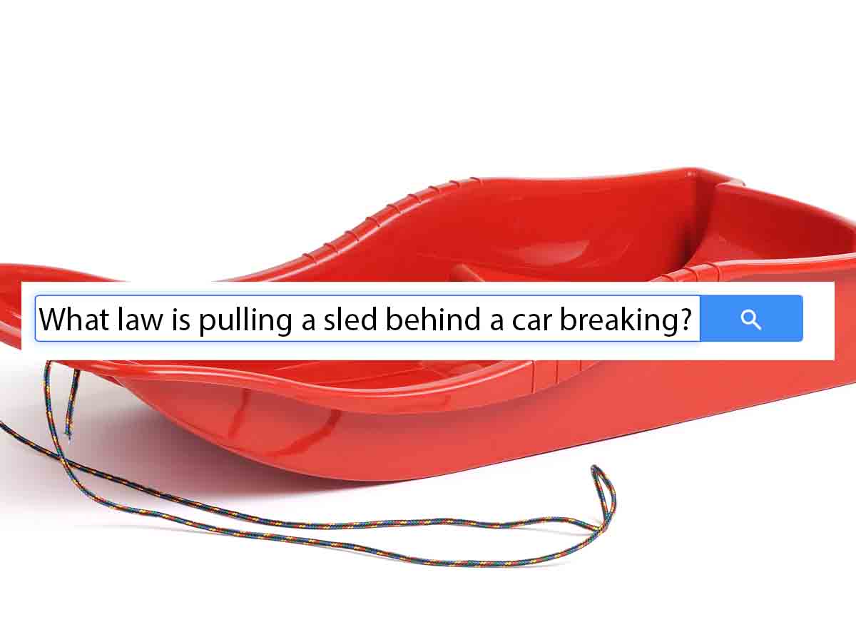 "What law is pulling a sled behind a car breaking?"