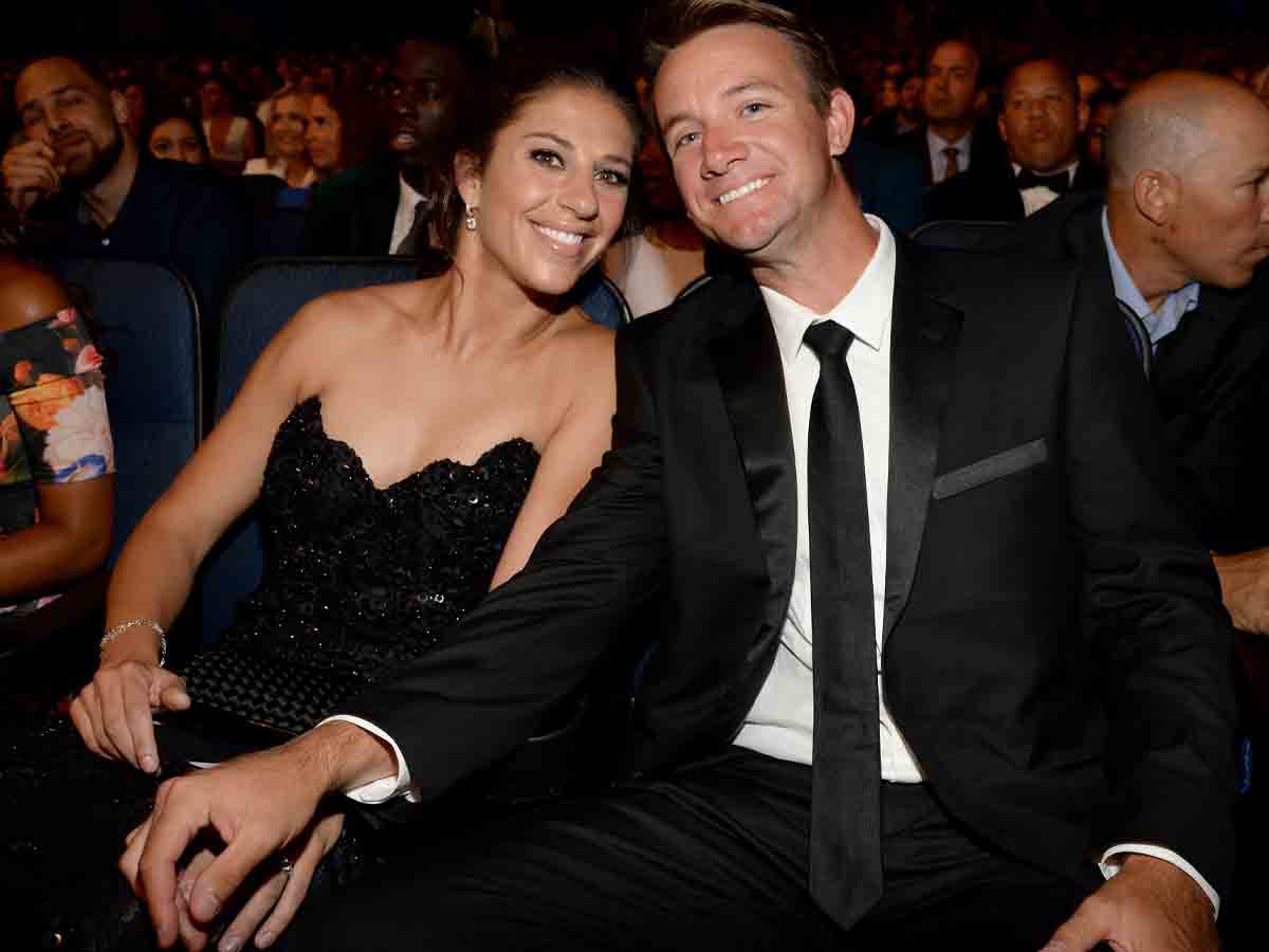 Carli Lloyd and Brian Hollins