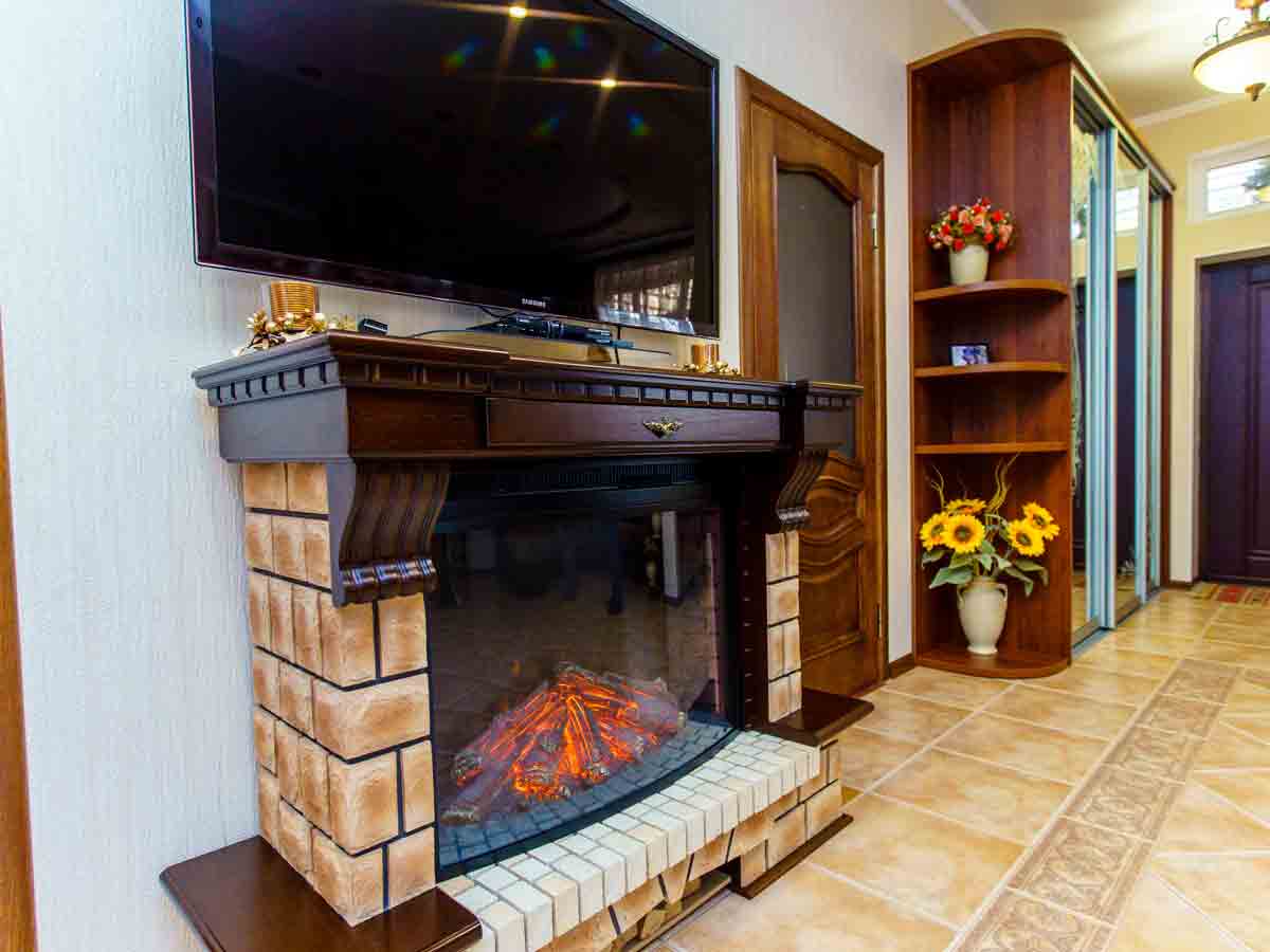 TVs Over the Fireplace