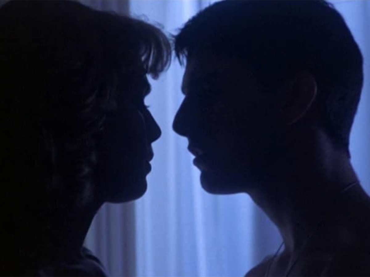 Thank “Take My Breath Away” for the love scene.