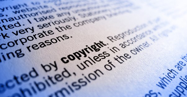 A picture of a page full of text with a focus on the word copyright.