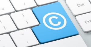 computer keybord key with the copyright symbol on it