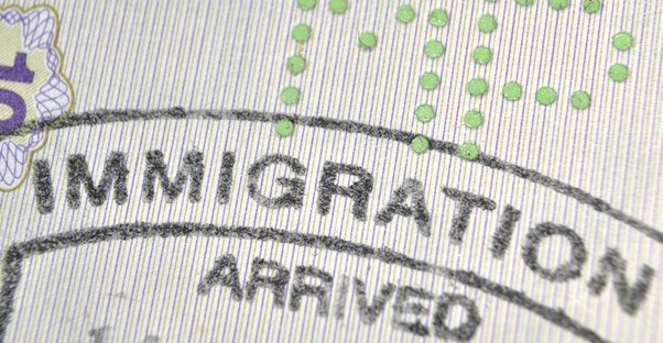 card stampped saying immigration approved