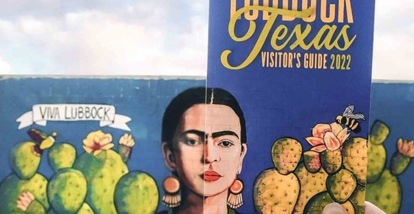 a frida kahlo mural on the side of grey edges art gallery in downtown lubbock texas