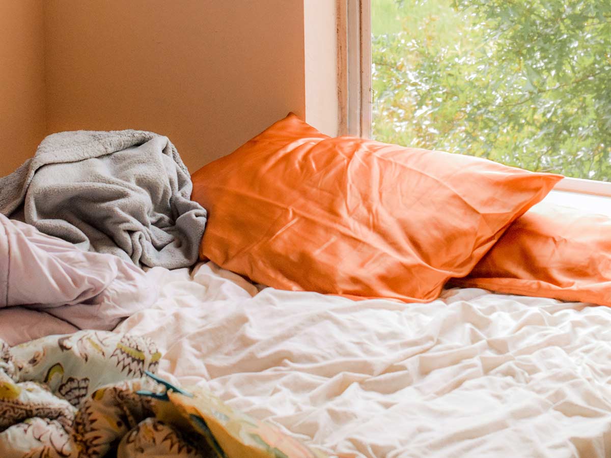 Draps de lit anciens et dépareillés