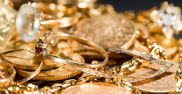 various types of gold times on a table