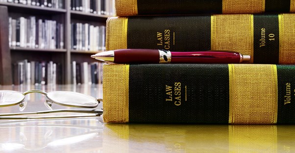 books on a table at one of the best law schools for a juris doctor degree