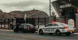 A back car pulled over for a ticket by police