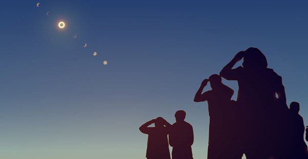 a group of people view the path of a solar eclipse