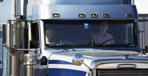 a person who has graduated from truck driving school