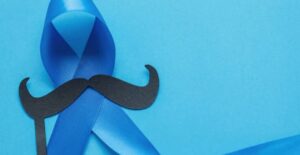A blue ribbon with a mustache