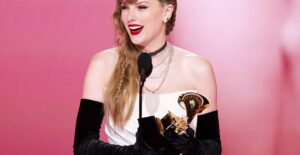 Taylor Swift accepting a Grammy
