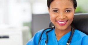a medical assistant standing in a hospital room