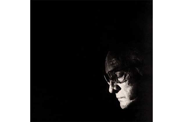 A Man in a Dark Room