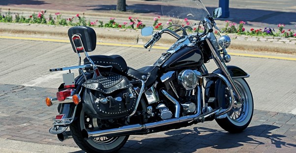 a harley davidson parked in a parking lot