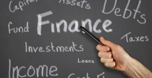 a teacher explaining debt management terms