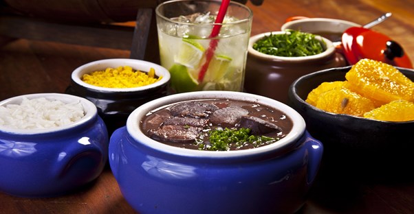 a table full of various Brazilian dishes