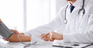 a doctor preparing to recommend a hypertension treatment