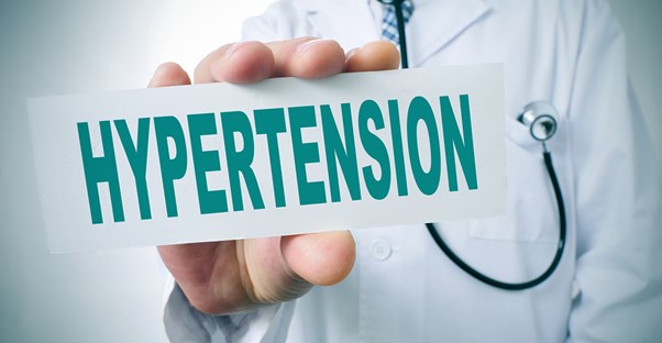 a doctor preparing to explain what hypertension is
