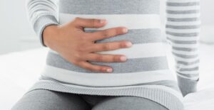 a woman suffering from gastroesophageal reflux disease