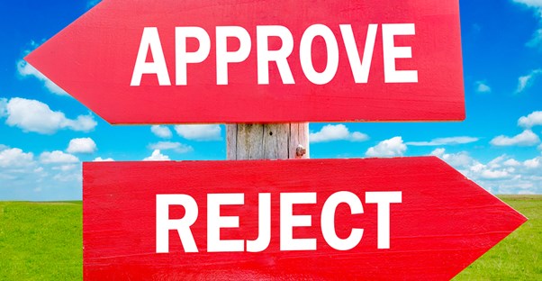 Direction signs pointing toward approval or rejection for social security disability
