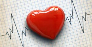 a heart pin on a heart rate sketch