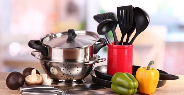 Kitchen utensils sitting on kitchen counter