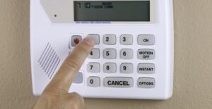 Homeowners sets up home security system