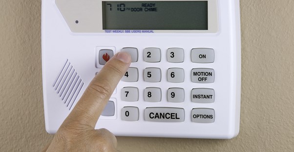 Homeowners sets up home security system