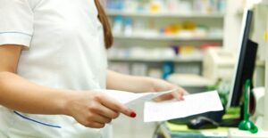 Pharmacy technician completing everyday tasks