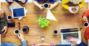 Group of associates discuss starting a business