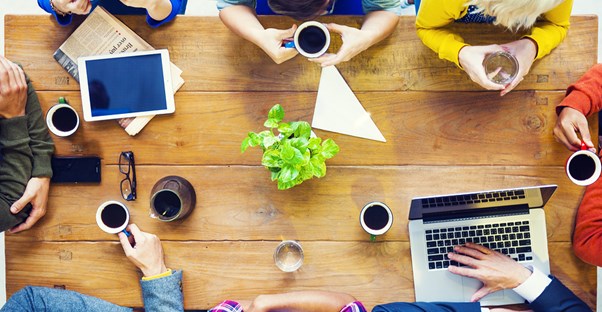 Group of associates discuss starting a business