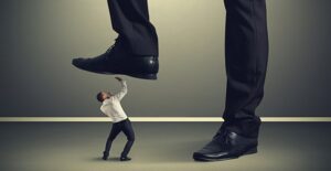 A visual representation of common mistakes stomping on a small business owner