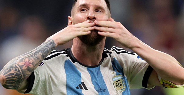 lionel messi blows a kiss to the crowd during an argentina national team soccer game