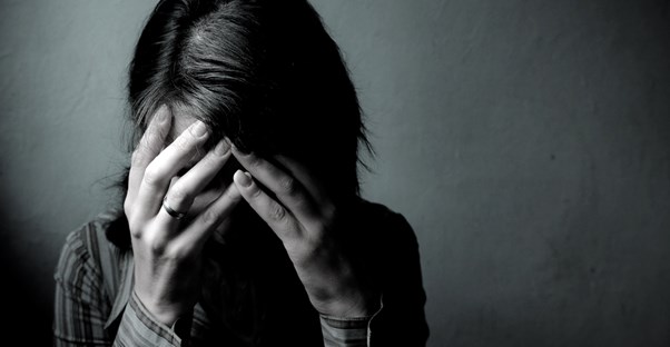 a woman with alcoholism is in deep emotional turmoil