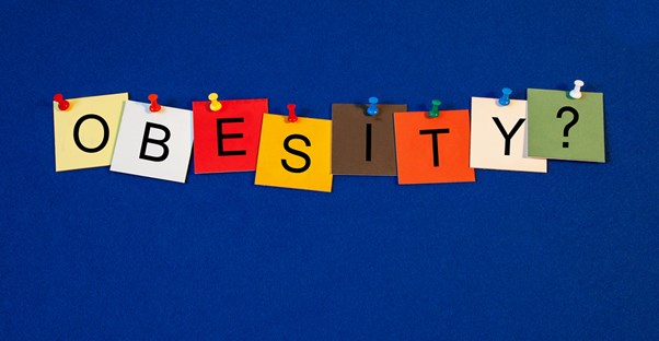 letters spelling out obesity