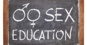 a chalkboard in a class used to educate teen about syphilis