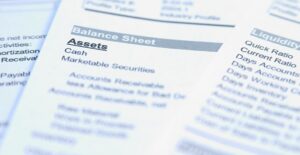 Close up of an asset balance sheet provided by an asset management firm